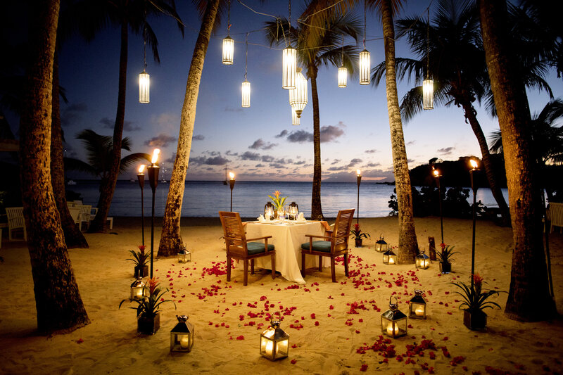 romantic candlelit dinner on private beach